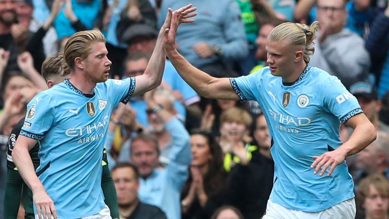 Manchester City's Erling Haaland celebrates with team-mates after scoring the equaliser (AP Photo/Scott Heppel)