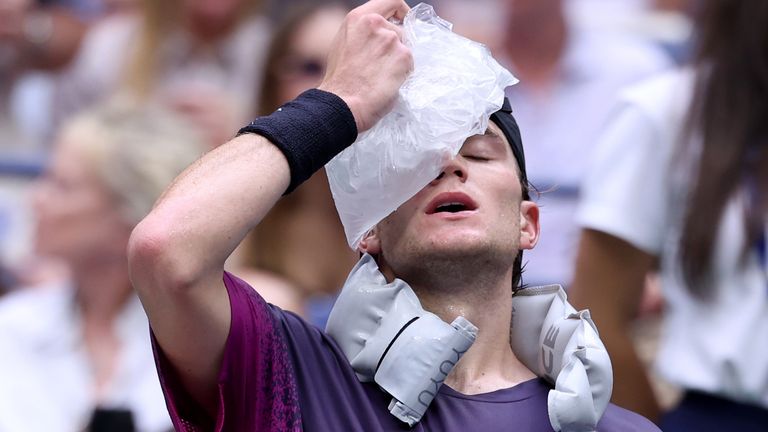 Jack Draper of Great Britain cools off during a changeover against Jannik Sinner of Italy during their Men's Singles Semifinal match on Day Twelve of the 2024 US Open at USTA Billie Jean King National Tennis Center on September 06, 2024 in the Flushing neighborhood of the Queens borough of New York City. (Photo by Al Bello/Getty Images)