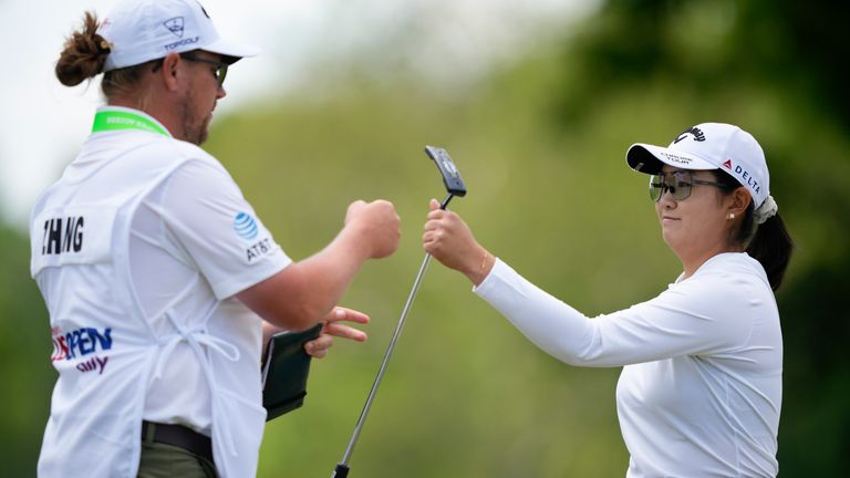 Rose Zhang bumps fists with her caddie on the third green during the first round of the U.S. Women&#39;s Open golf tournament at Lancaster Country Club, Thursday, May 30, 2024, in Lancaster, Pa. (AP Photo/Matt Slocum)