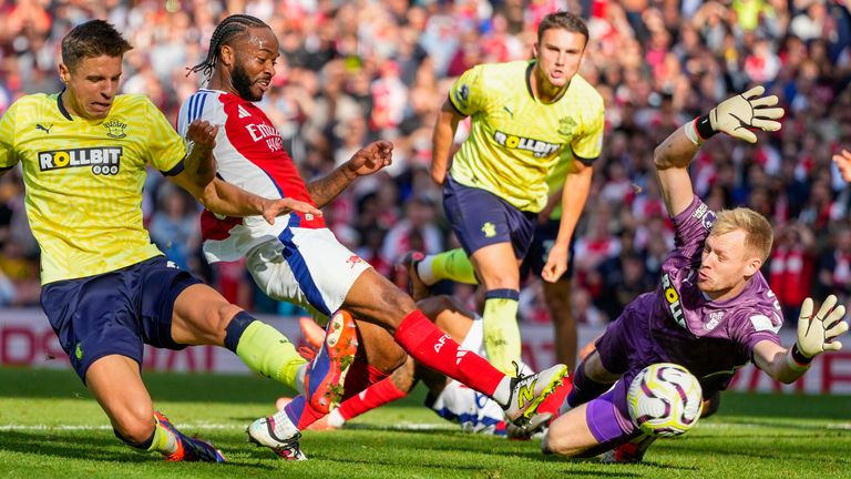 Southampton's goalkeeper Aaron Ramsdale stops a shot by Arsenal's Raheem Sterling