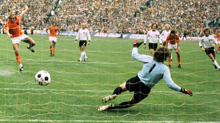 Holland's Johan Neeskens lashes the ball past West Germany goalkeeper Sepp Maier to score the opening goal from the penalty spot in the 1974 World Cup final
