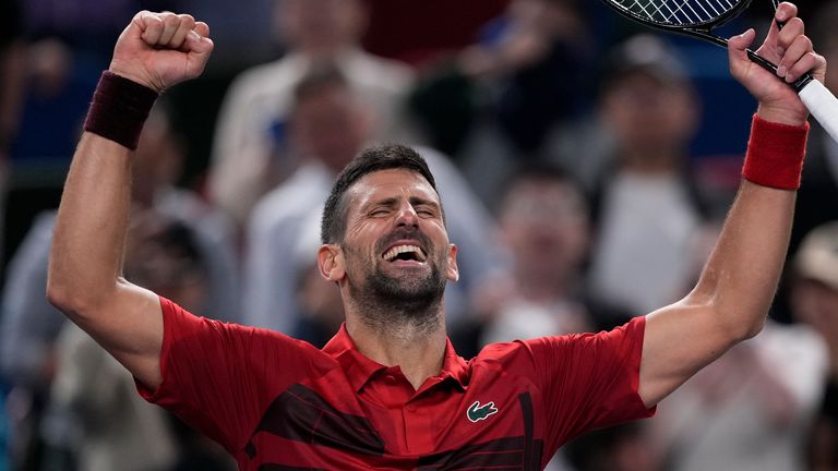 Novak Djokovic of Serbia celebrates after defeating Taylor Fritz of the United States in the men's singles semifinals match of the Shanghai Masters tennis tournament at Qizhong Forest Sports City Tennis Center in Shanghai, China, Saturday, Oct. 12, 2024. (AP Photo/Andy Wong)