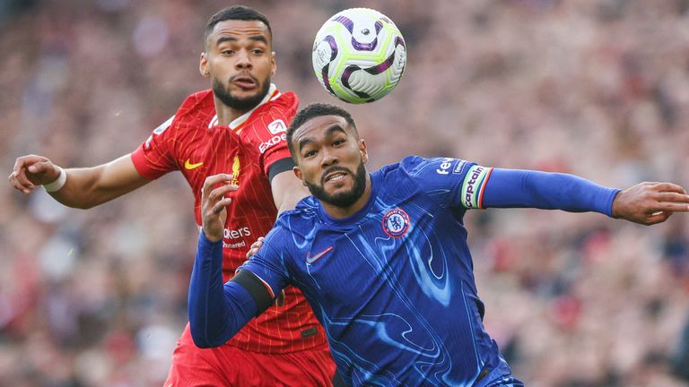 Reece James shields the ball from Cody Gakpo