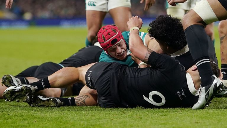 Ireland's Josh van der Flier scores a try against New Zealand