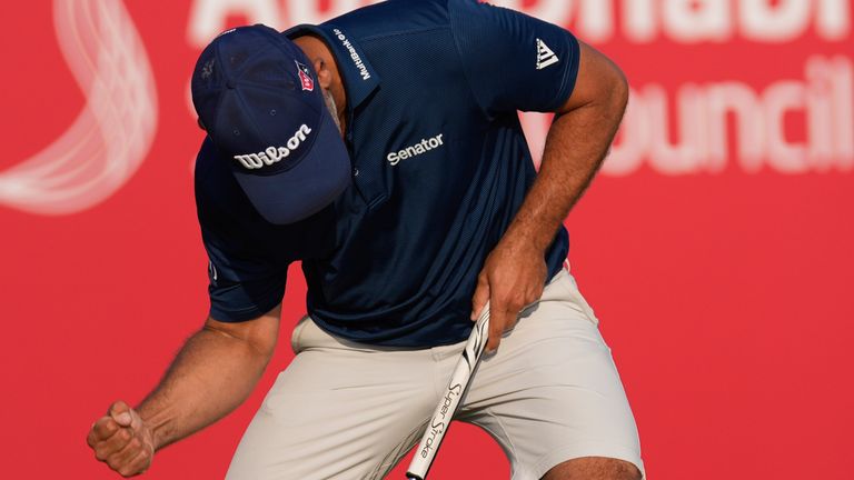 Paul Waring of England reacts after winning the Abu Dhabi Golf Championship in Abu Dhabi, United Arab Emirates, Sunday, Nov. 10, 2024. (AP Photo/Altaf Qadri)