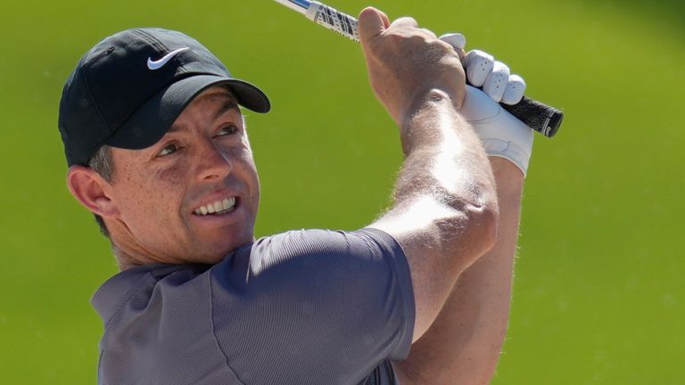 Rory McIlroy of Northern Ireland hits a shot from a bunker on the 4th hole during the second round of World Tour Golf Championship in Dubai, United Arab Emirates, Friday, Nov. 15, 2024. (AP Photo/Altaf Qadri) 