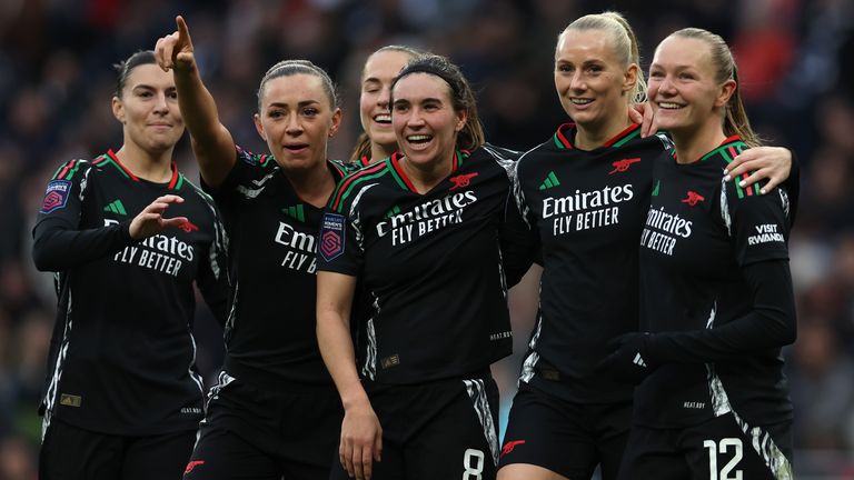 Arsenal players celebrate Stina Blackstenius' goal at Spurs