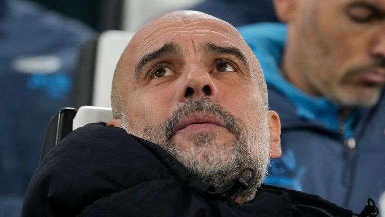 Manchester City's head coach Pep Guardiola sits on the bench ahead of the Champions League, opening phase soccer match between Juventus and Manchester City at the Allianz stadium in Turin, Italy, Tuesday, Wednesday, Dec.11, 2024. (AP Photo/Luca Bruno)