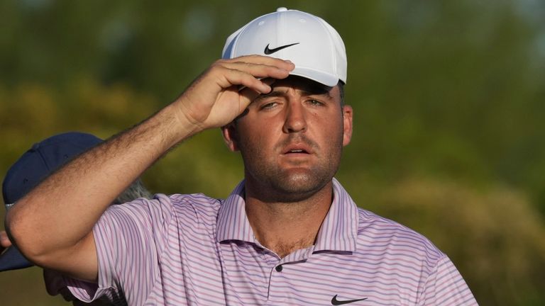 Scottie Scheffler, of the United States, reacts at the end of the second round of the Hero World Challenge PGA Tour at the Albany Golf Club in New Providence, Bahamas, Friday, Dec. 6, 2024. (AP Photo/Fernando Llano)