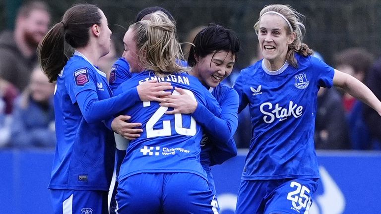 Honoka Hayashi celebrates with her team-mates after doubling Everton's lead against Man City