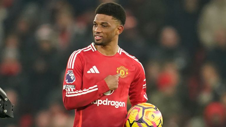 Manchester United's Amad Diallo celebrates after the English Premier League soccer match between Manchester United and Southampton at the Old Trafford stadium in Manchester, England, Thursday, Jan. 16, 2025. (AP Photo/Dave Thompson)