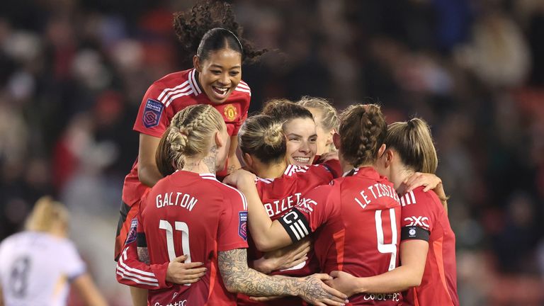 Celin Bizet Ildhusoy of Manchester United celebrates scoring her team's third goal with teammates during the Barclays Women's Super League match between Manchester United and Brighton & Hove Albion at Leigh Sports Village