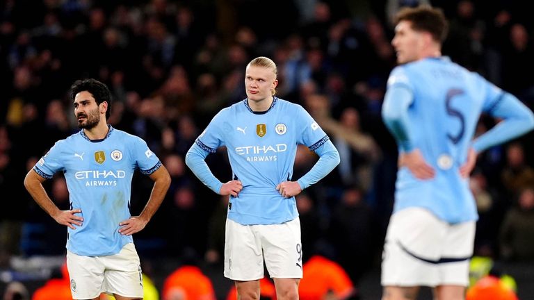 Ilkay Gundogan, Erling Haaland and John Stones stand dejected after Club Brugge take a shock lead against Manchester City