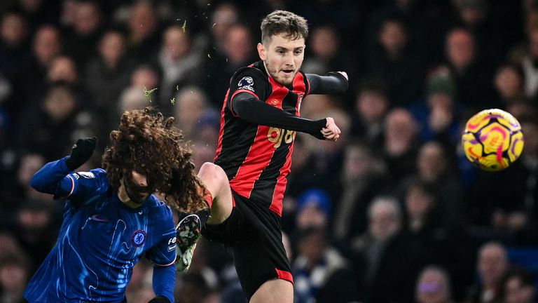 Chelseadefender Marc Cucurella (L) fights for the ball with Bournemouth's  David Brooks