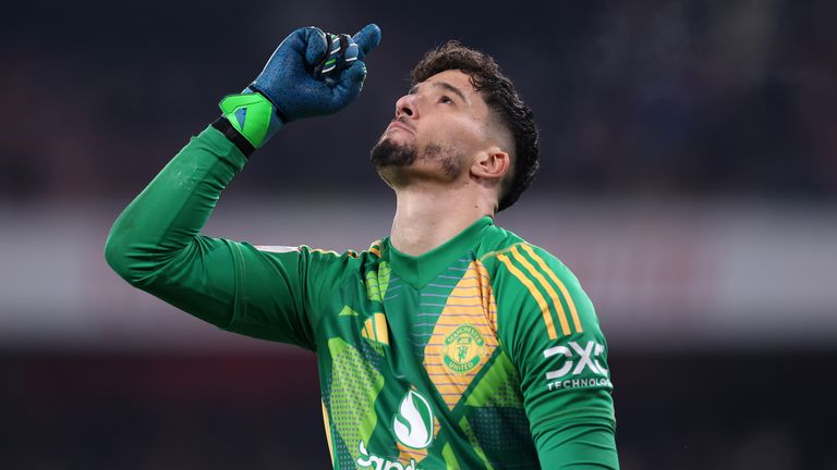 Altay Bayindir celebrates after saving Kai Havertz's penalty