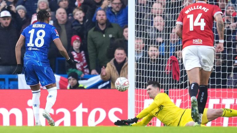 Harry Burgoyne saves Christopher Nkunku's penalty