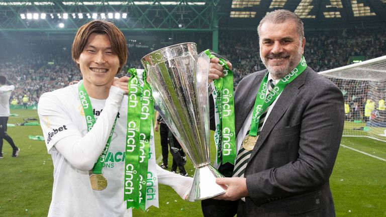 GLASGOW, SCOTLAND - MAY 27: Celtic...s Kyogo Furuhashi and Manager Ange Postecoglou celebrate winning the cinch Premiership title during a cinch Premiership match between Celtic and Aberdeen at Celtic Park, on May 27, 2023, in Glasgow, Scotland. (Photo by Craig Williamson / SNS Group)