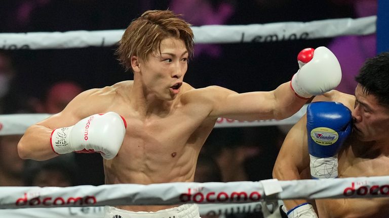 Japanese champion Naoya Inoue, left, and South Korea challenger Ye Joon Kim compete for the unified WBC IBF and WBO super bantamweight world title at the Ariake Arena in Tokyo, Friday, Jan. 24, 2025. (AP Photo/Hiro Komae)