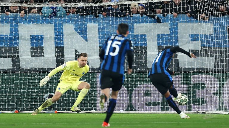 Club Brugge goalkeeper Simon Mignolet saves a penalty from Atalanta's Ademola Lookman