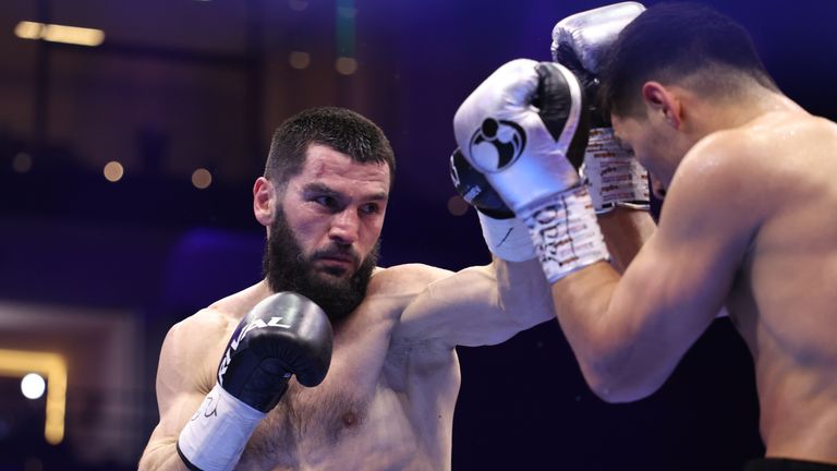 Artur Beterbiev attacks Dmitry Bivol (Photo: Leigh Dawney/Queensberry)