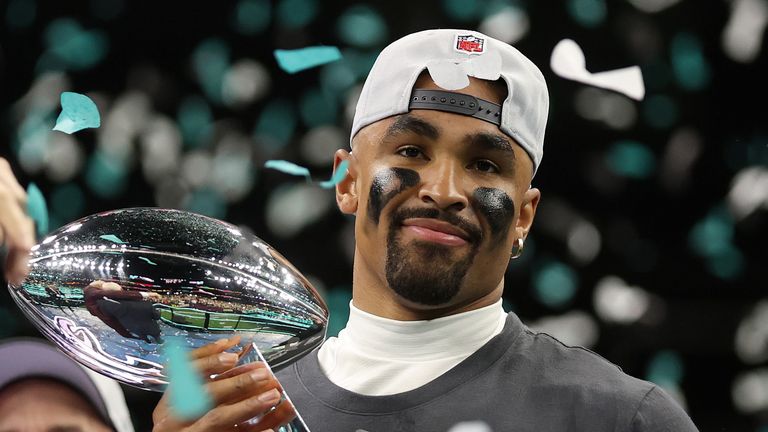 Jalen Hurts celebrates with the Lombardi Trophy 