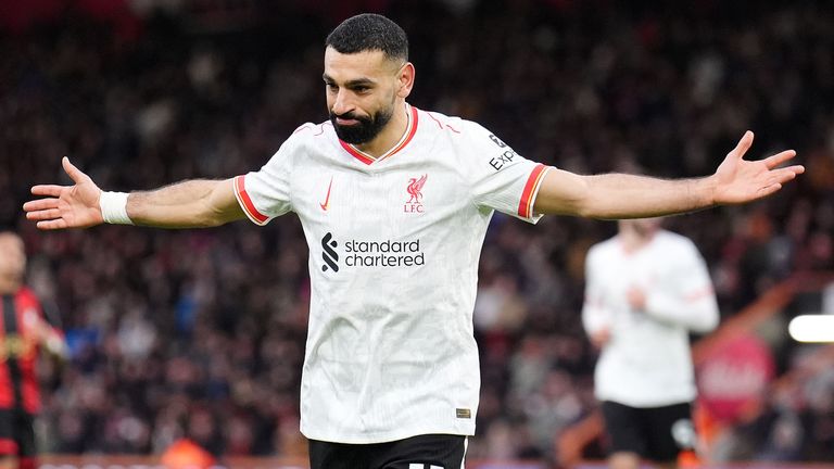 Mohamed Salah celebrates scoring his, and Liverpool's second goal of the game