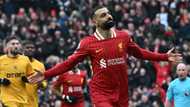 Mohamed Salah of Liverpool celebrates scoring his team's second goal from the penalty-spot