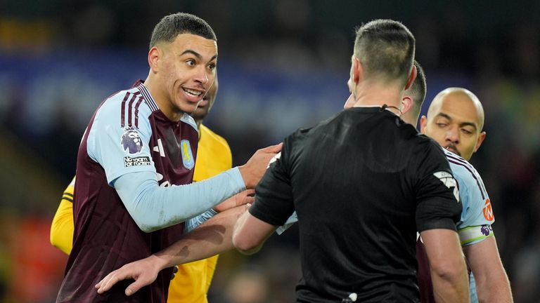 Morgan Rogers speaks with referee Andrew Madley after Donyel Malen (not pictured) has a goal ruled out for offside by VAR