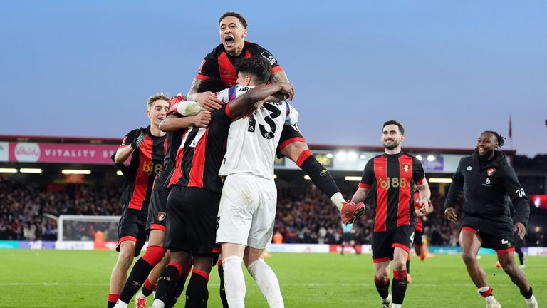 Bournemouth players celebrate winning on penalties