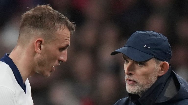 England coach Thomas Tuchel talks with Dan Burn during a World Cup qualifying soccer match between England and Albania at Wembley stadium in London, Friday, March 21, 2025. (AP Photo/Alastair Grant)