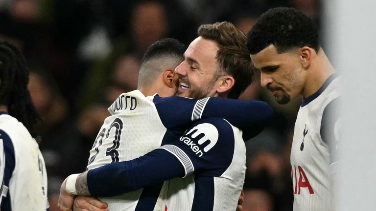 Tottenham Hotspur's English midfielder #10 James Maddison celebrates scoring the team's second goal with Tottenham Hotspur's Spanish defender #23 Pedro Porro during the UEFA Europa League Last 16 Second Leg football match between Tottenham Hotspur and AZ Alkmaar at the Tottenham Hotspur Stadium in London, on March 25, 2025. (Photo by Glyn KIRK / AFP)