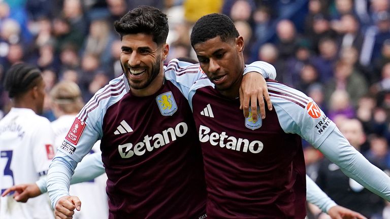 Marcus Rashford and Marco Asensio celebrate after Villa take the lead at Deepdale