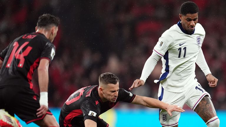 Marcus Rashford runs with the ball in England's World Cup qualifier against Albania