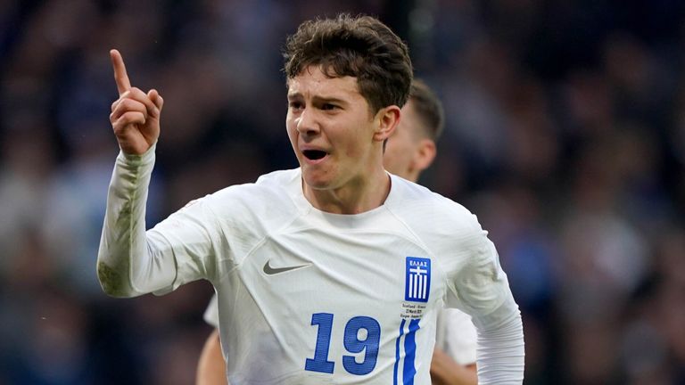 Konstantinos Karetsas celebrates after scoring Greece's second goal against Scotland