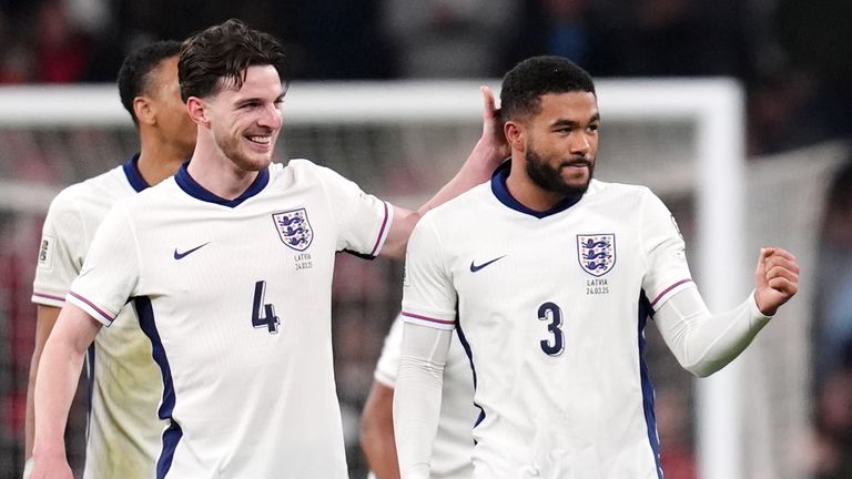England's Reece James (right) celebrates with team-mate Declan Rice after scoring against Latvia