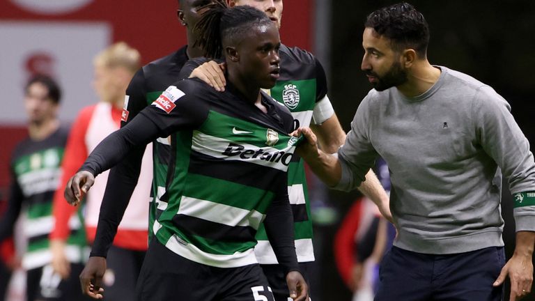 Sporting's head coach Ruben Amorim speaks to Sporting's Geovany Quenda who was getting involved in a scuffle during the Portuguese league soccer match between SC Braga and Sporting CP at the Municipal stadium in Braga, Portugal, Sunday, Nov. 10, 2024. (AP Photo/Luis Vieira)