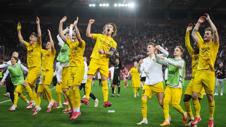 Bodo/Glimt players celebrate their qualification to the next phase after the end of the Europa League round of 16 second leg soccer match between Olympiacos FC and FK Bodo/Glimt at the Georgios Karaiskakis stadium at Athens' port of Piraeus, Greece, Thursday, March 13, 2025. (AP Photo/Thanassis Stavrakis)