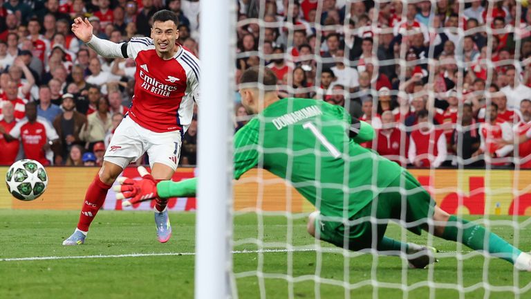 Gianluigi Donnarumma of Paris Saint-Germain saves from Gabriel Martinelli of Arsenal