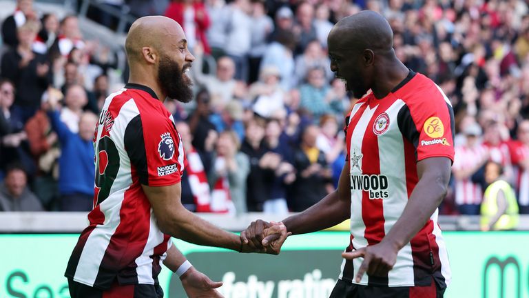 Goalscorers Bryan Mbeumo and Yoane Wissa celebrate after Brentford extend their lead against Brighton