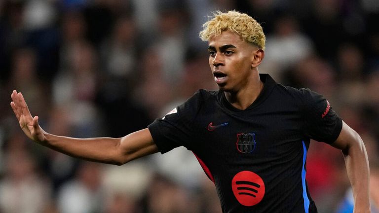 Barcelona's Lamine Yamal reacts after scoring during a Spanish La Liga soccer match between Espanyol and Barcelona in Barcelona, Spain, Thursday, May 15, 2025. (AP Photo/Jose Breton)