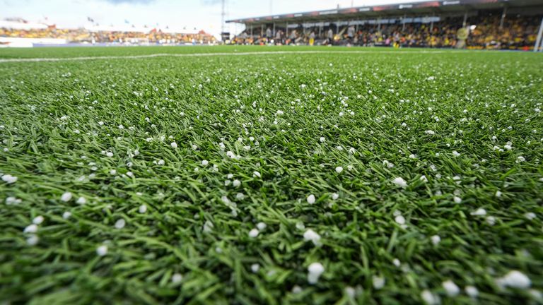 Small pieces of hail are seen before the start of the first leg quarter-final match of the UEFA Europa League between Bod../Glimt and Lazio at Aspmyra Stadium in Bodo, Norway, Thursday March 13, 2025. (Lise ..serud/NTB Scanpix via AP)