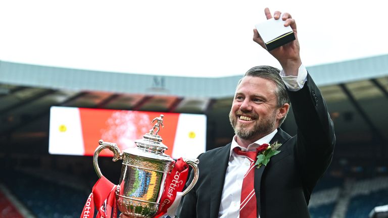 Aberdeen manager Jimmy Thelin with the Scottish Cup trophy 