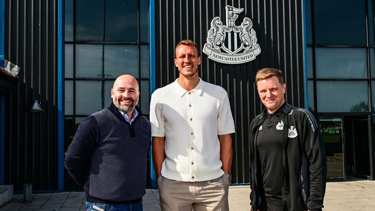 Paul Mitchell (left) pictured with Dan Burn (centre) and Eddie Howe after the defender signed a new deal at Newcastle