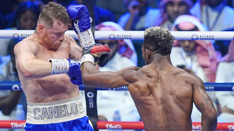William Scull, right, and Saul Canelo Alvarez fight during super middleweight World Boxing Championship at ANB Arena in Riyadh, Saudi Arabia, Sunday, May 4, 2025. (AP Photo)