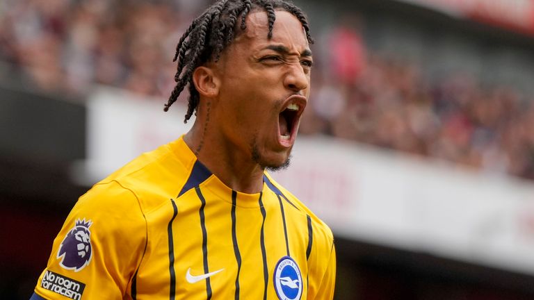 Brighton's Joao Pedro celebrates after scoring his side's opening goal during the English Premier League soccer match between Arsenal and Brighton, at Emirates Stadium in London, Saturday, Aug. 31, 2024. (AP Photo/Alastair Grant)