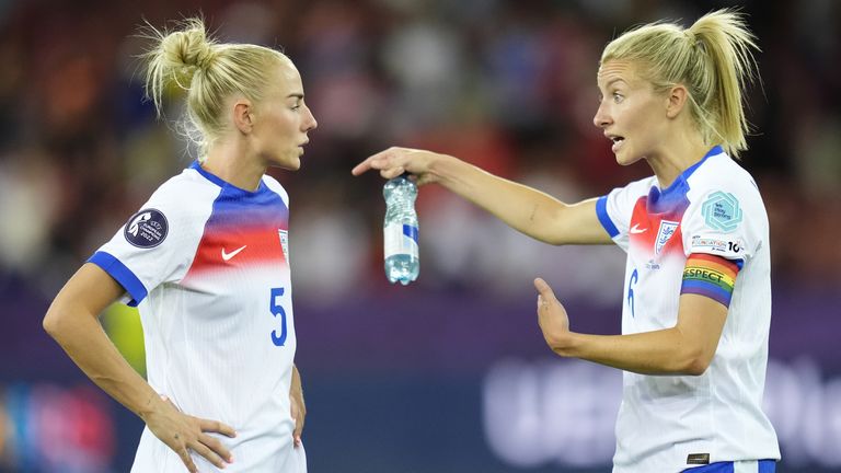 Alex Greenwood and Leah Williamson talk after England were beaten by France