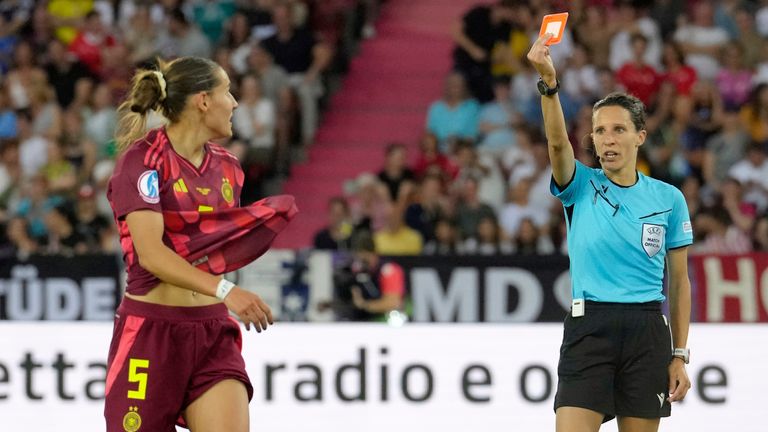 Referee Silvia Gasperotti shows a red card to Germany's Carlotta Wamser 