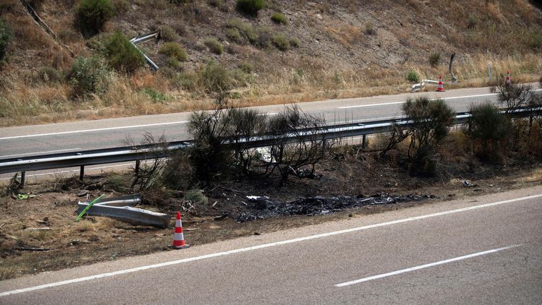 An image showing scorched grass where the crash took place (Europa Press via AP)