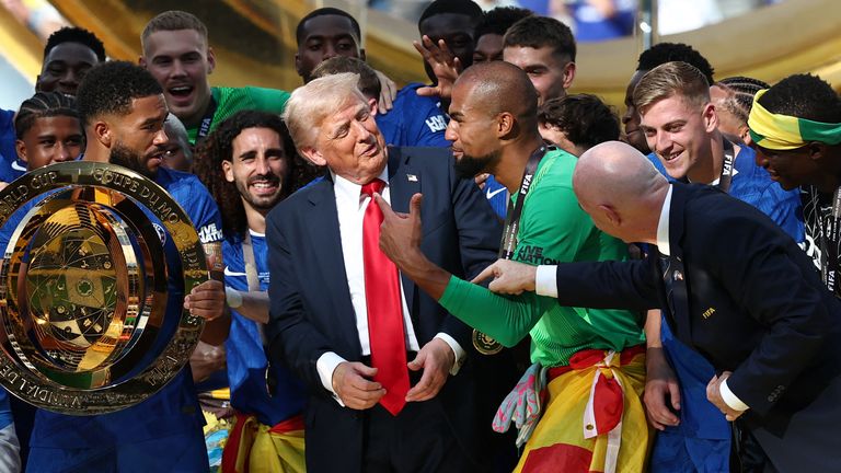 FIFA boss Gianni Infantino appeared to try to encourage USA President Donald Trump to step away so Chelsea could lift the trophy...