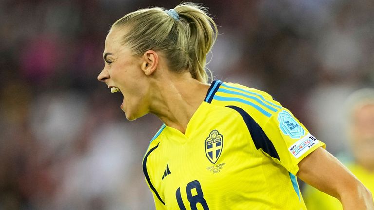 Sweden's Fridolina Rolfo celebrates after scoring her side's third goal from the penalty spot 